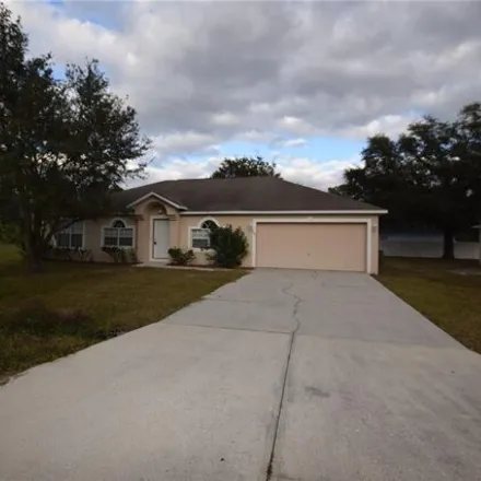 Rent this 4 bed house on 844 Halifax Drive in Poinciana, FL 34758