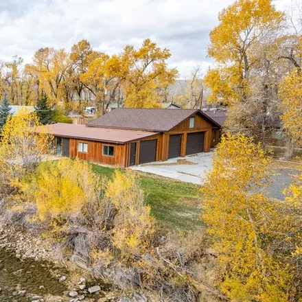 Buy this 4 bed house on 1000 River Grove Drive in Park County, WY 82433