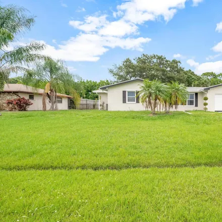 Buy this 2 bed house on 713 Southeast Chaloupe Avenue in Port Saint Lucie, FL 34983