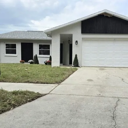 Buy this 3 bed house on 8628 Woodcrest Drive in Bayonet Point, FL 34668