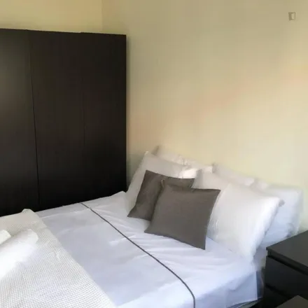 Rent this 3 bed room on Rua do Embaixador in 1300-217 Lisbon, Portugal
