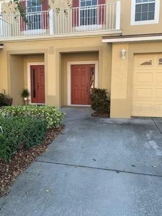 Rent this 3 bed townhouse on 2984 Ashland Lane South in Kissimmee, FL 34741