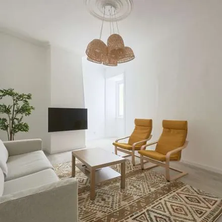 Rent this 11 bed apartment on Embassy of the United Kingdom in Rua de São Bernardo 33, 1249-082 Lisbon