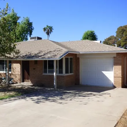 Rent this 4 bed house on 5548 North 12th Avenue in Phoenix, AZ 85013