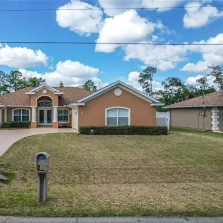 Rent this 3 bed house on 8 Rocking Horse Drive in Palm Coast, FL 32164
