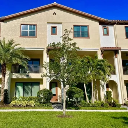 Rent this 3 bed townhouse on 12666 Machiavelli Way in Palm Beach Gardens, Florida