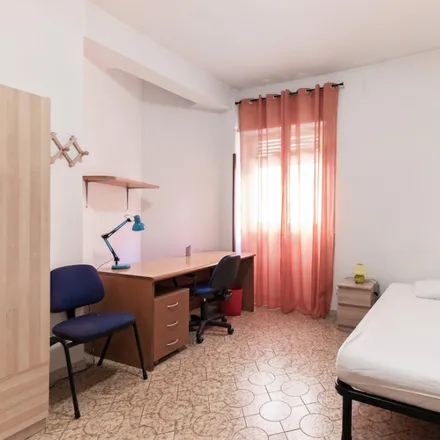 Rent this 4 bed room on Piazza Giuseppe Cardinali in 00177 Rome RM, Italy