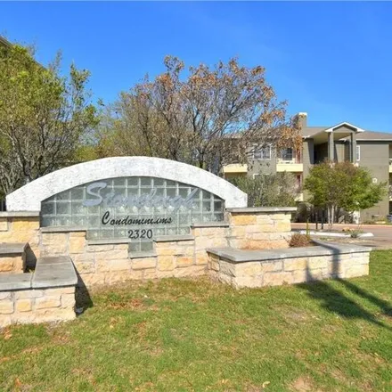 Rent this 2 bed condo on 2320 Gracy Farms Lane in Austin, TX 78758