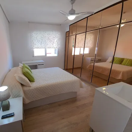 Rent this 3 bed room on Carrer de la Reina in 276, 46011 Valencia
