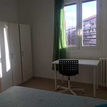 Rent this 4 bed room on Calle Divino Vallés in 14, 28045 Madrid