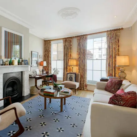 Buy this 4 bed townhouse on 11 Penzance Place in London, W11 4PE