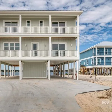 Buy this 7 bed house on 2776 West Beach Boulevard in Gulf Shores, AL 36542