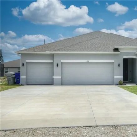 Buy this 5 bed house on 8966 102nd Court in Vero Lake Estates, Indian River County