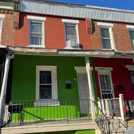 Buy this 4 bed house on 6447 Glenmore Avenue in Philadelphia, PA 19142