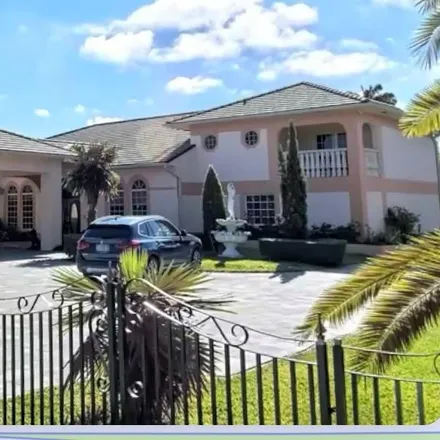 Buy this 5 bed house on 9880 Northwest 137th Street in Hialeah Gardens, FL 33018