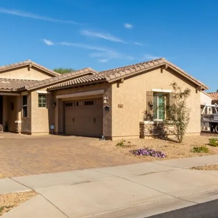 Rent this 3 bed house on 14428 West Almeria Road in Goodyear, AZ 85395