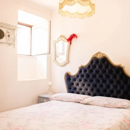 Rent this 3 bed room on Cozy Penthouse in Biarro Alto in Travessa da Espera, 1200-047 Lisbon
