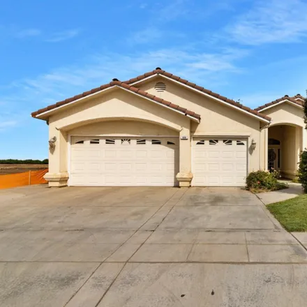 Buy this 4 bed house on 886 Caitlan Drive in Madera, CA 93637