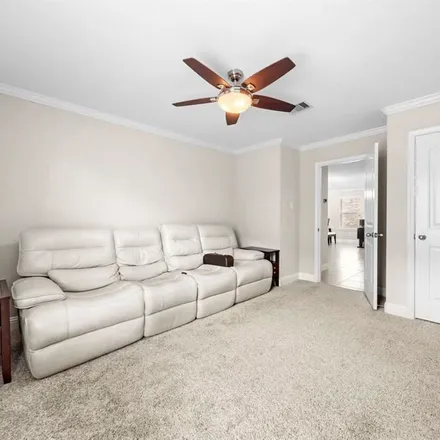 Rent this 4 bed apartment on 3027 Veeder Pass Lane in Fort Bend County, TX 77494