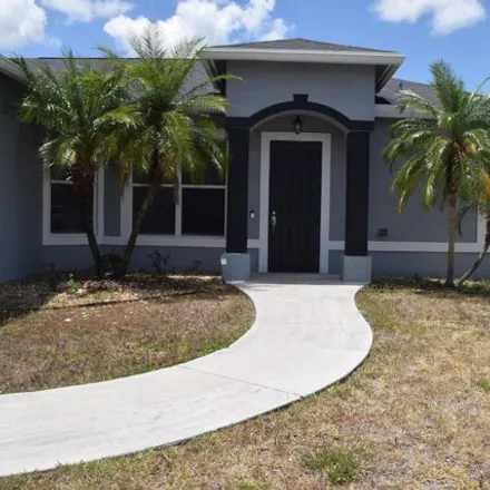 Rent this 4 bed house on 4000 Southwest Jarmer Road in Port Saint Lucie, FL 34953