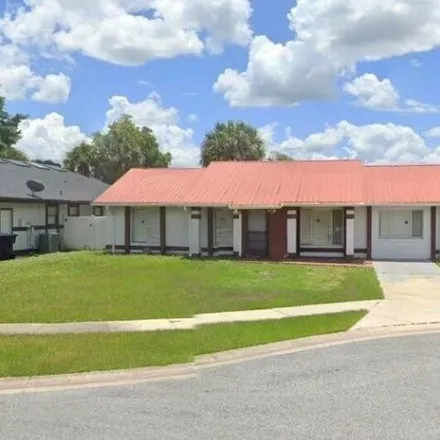 Rent this 4 bed house on Ramsgate Circle in Orange County, FL 32837