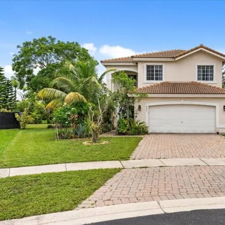 Buy this 4 bed house on 6622 Adriatic Way in West Palm Beach, Florida