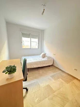 Rent this 4 bed room on Calle María Malibrán in 14011 Córdoba, Spain