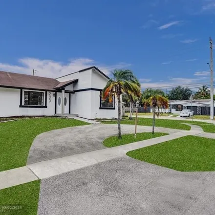 Buy this 3 bed house on 200 Se 7th St in Dania Beach, Florida