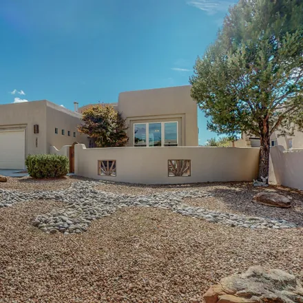 Buy this 3 bed house on 13032 Sandia Point Road Northeast in High Desert, Albuquerque