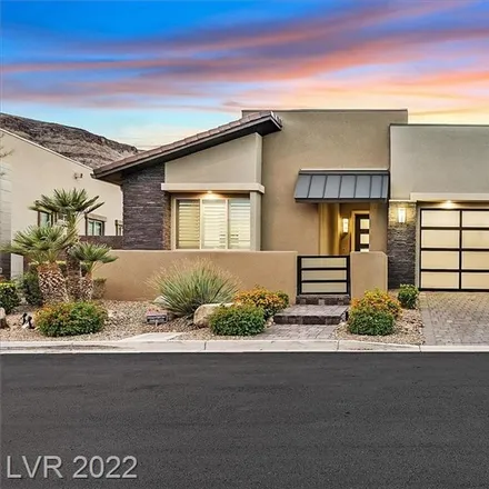 Buy this 4 bed house on 10700 Hobbiton Avenue in Summerlin South, NV 89135
