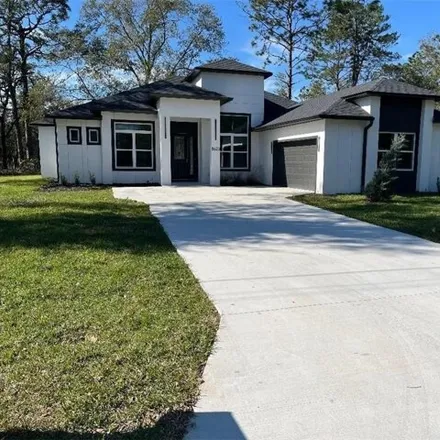Buy this 4 bed house on 8640 North Calypso Circle in Citrus Springs, FL 34434