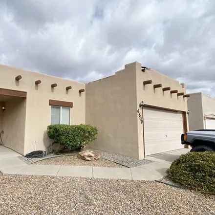 Buy this 2 bed house on 6857 Calle Laguna Northeast in Albuquerque, NM 87113