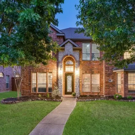 Buy this 5 bed house on 13826 Dutch Hollow Drive in Frisco, TX 75068