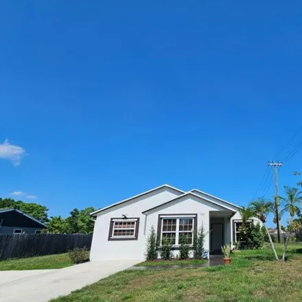 Rent this 4 bed house on 1269 Grandview Circle in Royal Palm Beach, Palm Beach County