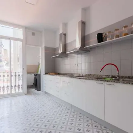 Rent this 8 bed apartment on Carrer de Fèlix Pizcueta in 46004 Valencia, Spain