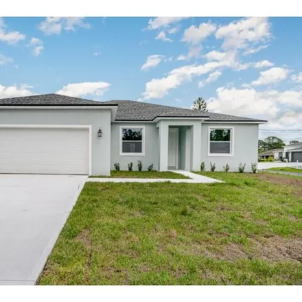 Buy this 4 bed house on 336 Wardell Avenue Southwest in Palm Bay, FL 32908