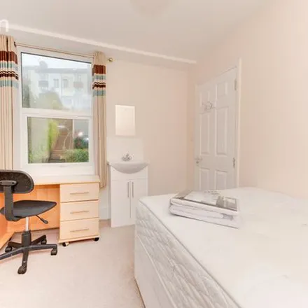 Rent this 6 bed townhouse on Primrose Cottage in 128 Balfour Road, Brighton