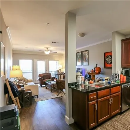 Rent this 3 bed condo on 910 West 25th Street in Austin, TX 78705