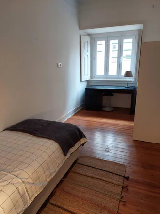 Rent this 3 bed room on Rua Frei Bartolomeu dos Mártires in 1300-166 Lisbon, Portugal