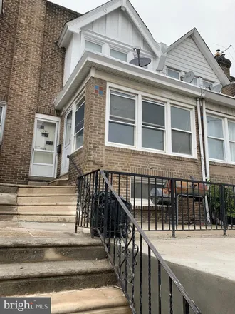 Rent this 2 bed townhouse on 6619 Guyer Avenue in Philadelphia, PA 19142