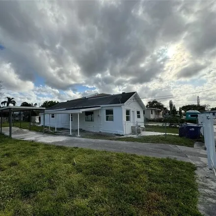 Rent this 4 bed house on 1858 Northwest 69th Terrace in Liberty Square, Miami