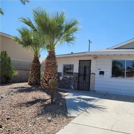 Rent this 4 bed house on 317 Rossmoyne Avenue in North Las Vegas, NV 89030