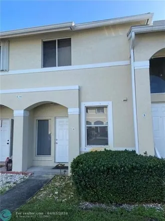 Rent this 2 bed townhouse on 830 Northeast 212th Terrace in Miami-Dade County, FL 33179