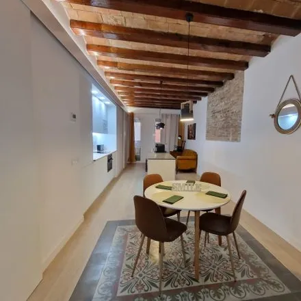 Rent this 4 bed apartment on Carrer de Cabanes in 08001 Barcelona, Spain