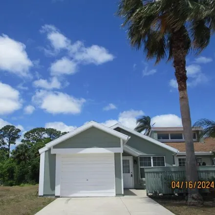Rent this 2 bed house on 1630 Southeast Gainswood Court in Port Saint Lucie, FL 34952