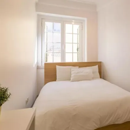 Rent this 7 bed room on Rua da Bombarda in 1100-085 Lisbon, Portugal