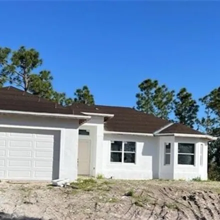 Buy this 3 bed house on 109 Paxton St in Lehigh Acres, Florida