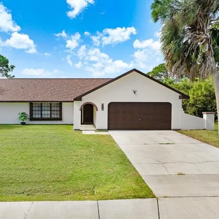 Buy this 3 bed house on 968 Pembroke Avenue Northeast in Palm Bay, FL 32907