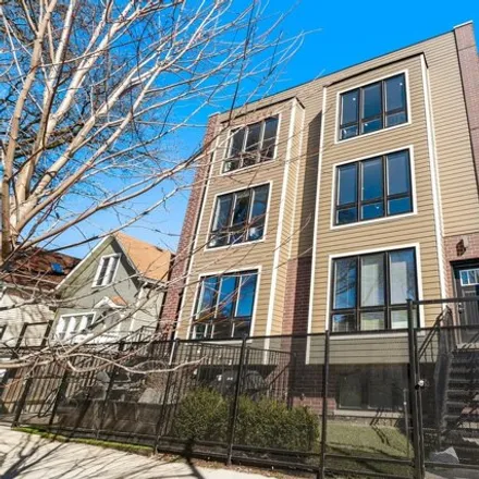 Buy this 3 bed condo on 1815-1817 North Saint Louis Avenue in Chicago, IL 60647