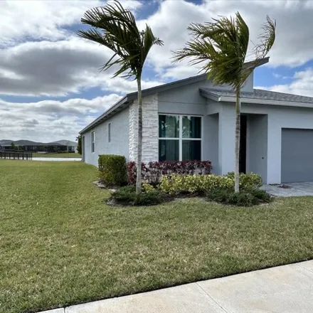 Buy this 3 bed house on Southwest Lyra Drive in Port Saint Lucie, FL 34987